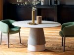 Table ronde avec pied conique recouvert de tissu, cuir ou simili et plateau 140 160 cm en bois ou céramique