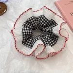 Chouchou en dentelle à volants élégant